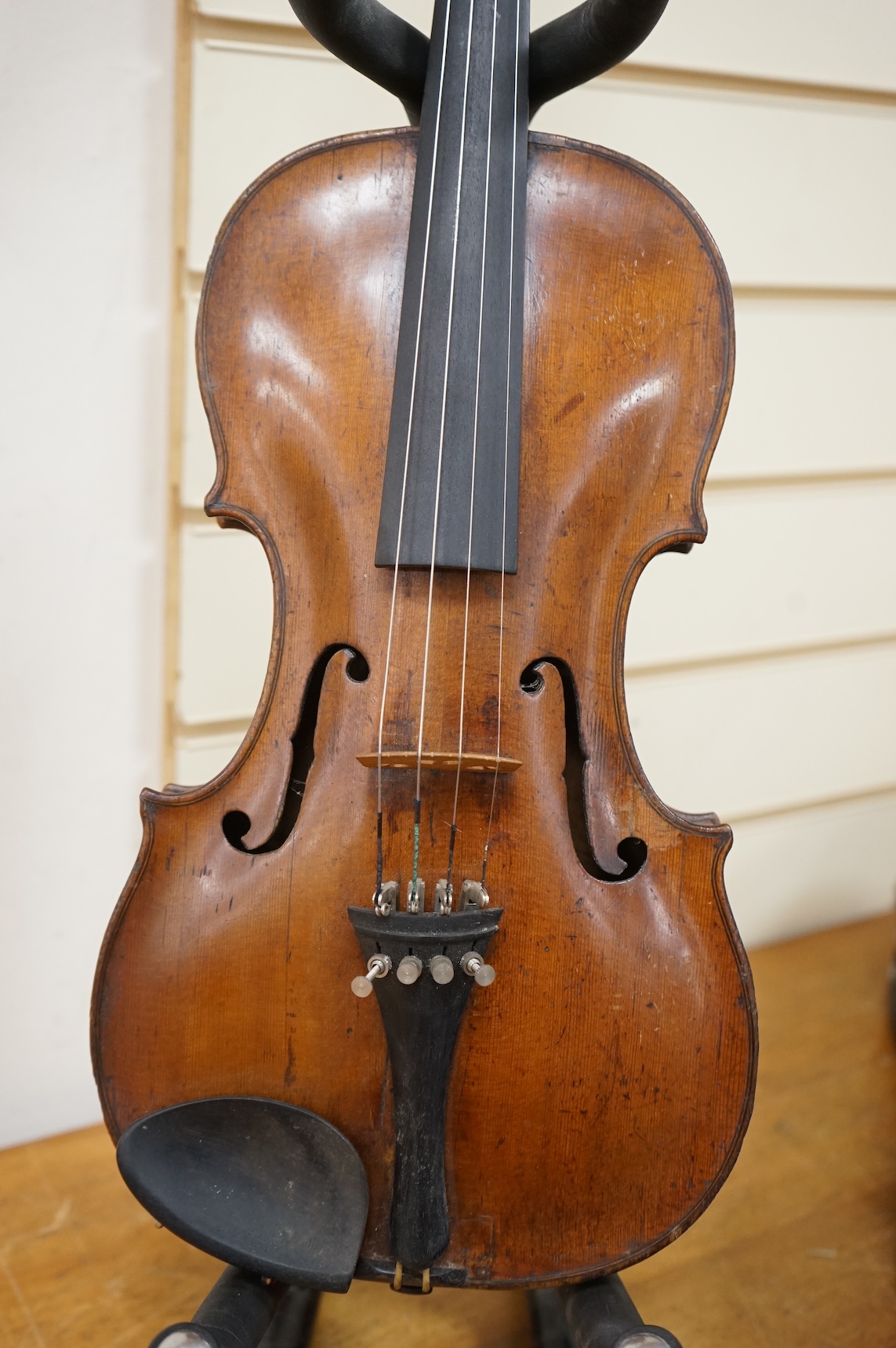 A late 18th century cased English violin, possibly after Richard Duke, length of body 35.5cm.